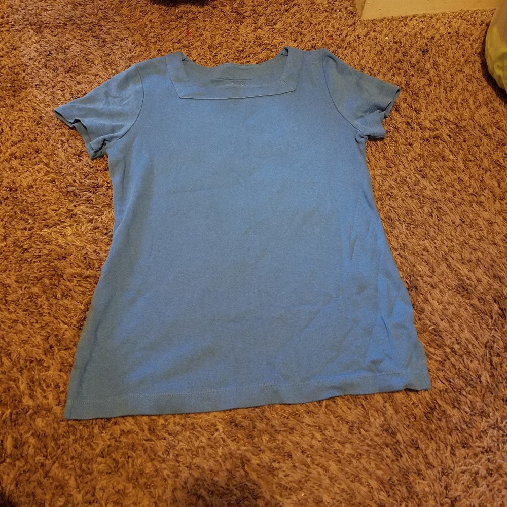 Size small 100% cotton plain light blue tee